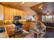 Bright kitchen with wood countertops and stainless steel appliances at 636 Chute Rd, Golden, CO 80403
