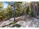 Wooded property with path and level area with target at 636 Chute Rd, Golden, CO 80403