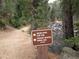 Trail marker for Walker Ranch Loop Trail and parking area at 636 Chute Rd, Golden, CO 80403