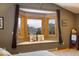 Scenic bay window featuring bench seat with views of the mountains and natural light at 636 Chute Rd, Golden, CO 80403