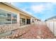 Charming backyard with patio area, rock landscaping, and privacy fence is perfect for relaxation and outdoor enjoyment at 19377 E Radcliff Pl, Aurora, CO 80015