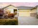 Charming single-Gathering home featuring a two-car garage and well-maintained landscaping at 19377 E Radcliff Pl, Aurora, CO 80015