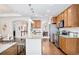 Kitchen featuring an eat-in island, stainless steel appliances, and modern recessed lighting at 19377 E Radcliff Pl, Aurora, CO 80015