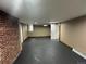 Finished basement space with new flooring, fresh paint, and potential for a versatile living area at 1625 N Downing St, Denver, CO 80218