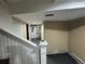 Spacious basement area with freshly painted walls, new flooring, and updated lighting fixtures at 1625 N Downing St, Denver, CO 80218