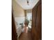 Bathroom with a window, white wainscoting, vanity, toilet and bathtub at 1625 N Downing St, Denver, CO 80218