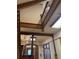 View of the entryway showing an architectural wooden staircase and vintage doors at 1625 N Downing St, Denver, CO 80218
