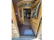 Grand foyer with stunning wood detailing and hardwood floors creates a memorable entrance at 1625 N Downing St, Denver, CO 80218