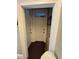Hallway with white paneled doors offering privacy, neutral wall colors, and carpeted floor for comfort at 1625 N Downing St, Denver, CO 80218
