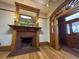 Living room showcasing a decorative fireplace, mantle, and period details at 1625 N Downing St, Denver, CO 80218