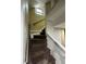 Classic stairway with wooden stairs and white banister offering a view to the upper level at 1625 N Downing St, Denver, CO 80218