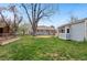 Expansive backyard, with grass, raised garden bed, with room to play at 3278 S Lafayette St, Englewood, CO 80113