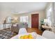 Bright living room with hardwood floors, modern decor, comfortable seating, and a view of the outdoors at 3278 S Lafayette St, Englewood, CO 80113