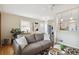 Open-concept living area with seamless access to the kitchen, modern appliances, and stylish furnishings at 3278 S Lafayette St, Englewood, CO 80113