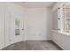 Neutrally decorated bedroom with bright window with shutters and closet at 8427 S Hoyt Way # 107, Littleton, CO 80128