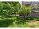 Well-maintained lawn complements the building's stone accents at 8427 S Hoyt Way # 107, Littleton, CO 80128