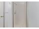 Bathroom with white tile shower and updated fixtures at 8427 S Hoyt Way # 107, Littleton, CO 80128