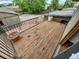 Outdoor deck with a black iron fence with potted plant decorations at 902 S Potomac Way, Aurora, CO 80012