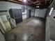 Spacious garage featuring storage cabinets and an automatic overhead door at 902 S Potomac Way, Aurora, CO 80012