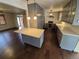 Stylish kitchen featuring an island and stainless steel appliances at 902 S Potomac Way, Aurora, CO 80012