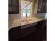 Modern farmhouse kitchen featuring a large sink and ample countertop space at 902 S Potomac Way, Aurora, CO 80012