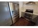 Modern kitchen featuring stainless steel appliances and subway tile backsplash at 902 S Potomac Way, Aurora, CO 80012