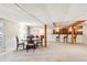 Basement featuring a dining table and a wet bar, perfect for entertaining at 4675 S Yosemite St # 205, Denver, CO 80237