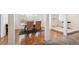 View of the dining room, showing hardwood flooring and natural light, as well as an entry point at 4675 S Yosemite St # 205, Denver, CO 80237