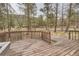 Deck featuring wood railings and scenic views at 31168 Witteman Rd, Conifer, CO 80433