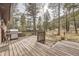 A view of the outdoor deck with a grill ready for outdoor cooking at 31168 Witteman Rd, Conifer, CO 80433