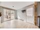 A view of a bright living space that accesses the outdoor deck through sliding glass doors at 31168 Witteman Rd, Conifer, CO 80433
