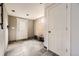 Mud room featuring tile floor, bench, and coat rack at 31168 Witteman Rd, Conifer, CO 80433