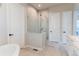 Modern bathroom with a glass-enclosed shower, tile flooring, and neutral decor at 425 W 128Th Dr, Westminster, CO 80234