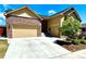 Beautiful home with a spacious driveway leading to a three car garage and landscaped front yard at 425 W 128Th Dr, Westminster, CO 80234
