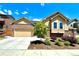 Charming home featuring a brick and siding exterior, well-manicured landscaping and an attached two car garage at 425 W 128Th Dr, Westminster, CO 80234