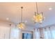 Modern geometric light fixtures above kitchen island at 425 W 128Th Dr, Westminster, CO 80234