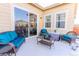 Peaceful patio with wicker furniture and a view of the backyard at 425 W 128Th Dr, Westminster, CO 80234