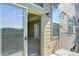 Balcony with sliding glass doors, offering a seamless transition to the outdoor space at 7931 W 55Th Ave # 105, Arvada, CO 80002