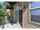 View of the open balcony with sliding glass doors inviting fresh air and natural light at 7931 W 55Th Ave # 105, Arvada, CO 80002