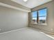 Neutral bedroom with carpet, ceiling fan, and bright windows at 7931 W 55Th Ave # 105, Arvada, CO 80002