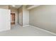 Neutral bedroom with carpet, closet, and view of en-suite bathroom at 7931 W 55Th Ave # 105, Arvada, CO 80002