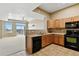Bright kitchen features stainless steel appliances and lots of cabinet space at 7931 W 55Th Ave # 105, Arvada, CO 80002