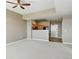Spacious living room flows into an open kitchen concept, highlighted by modern lighting and neutral walls at 7931 W 55Th Ave # 105, Arvada, CO 80002