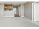 Neutral living room with open access to the kitchen, showcasing the spacious layout and natural light at 7931 W 55Th Ave # 105, Arvada, CO 80002