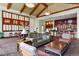 Upscale lounge area featuring a cozy seating arrangement and a bar area, perfect for entertaining at 7931 W 55Th Ave # 105, Arvada, CO 80002