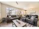 Spacious living room with hardwood floors and plenty of natural light at 11769 Lovegrass Dr, Parker, CO 80138