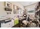 Home office with built-in shelving and a well-lit workspace at 11769 Lovegrass Dr, Parker, CO 80138