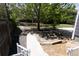 The backyard boasts mature trees, manicured landscaping, and a stone pathway, perfect for relaxing outdoors at 3725 S Nepal St, Aurora, CO 80013
