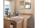 Bathroom sink and vanity area featuring modern faucet and ample counter space at 3725 S Nepal St, Aurora, CO 80013