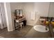 Large bathroom with tile flooring, dual sinks, and ample counter space at 3725 S Nepal St, Aurora, CO 80013
